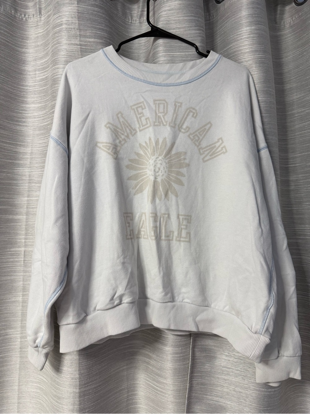 American Eagle Outfitters Pale Blue Crewneck with Sunflower Graphic